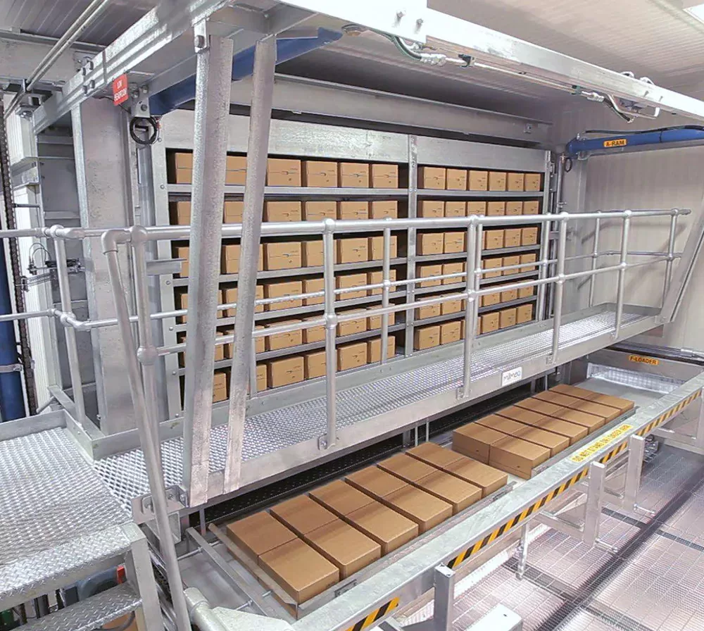 Congelador de cajas continuo